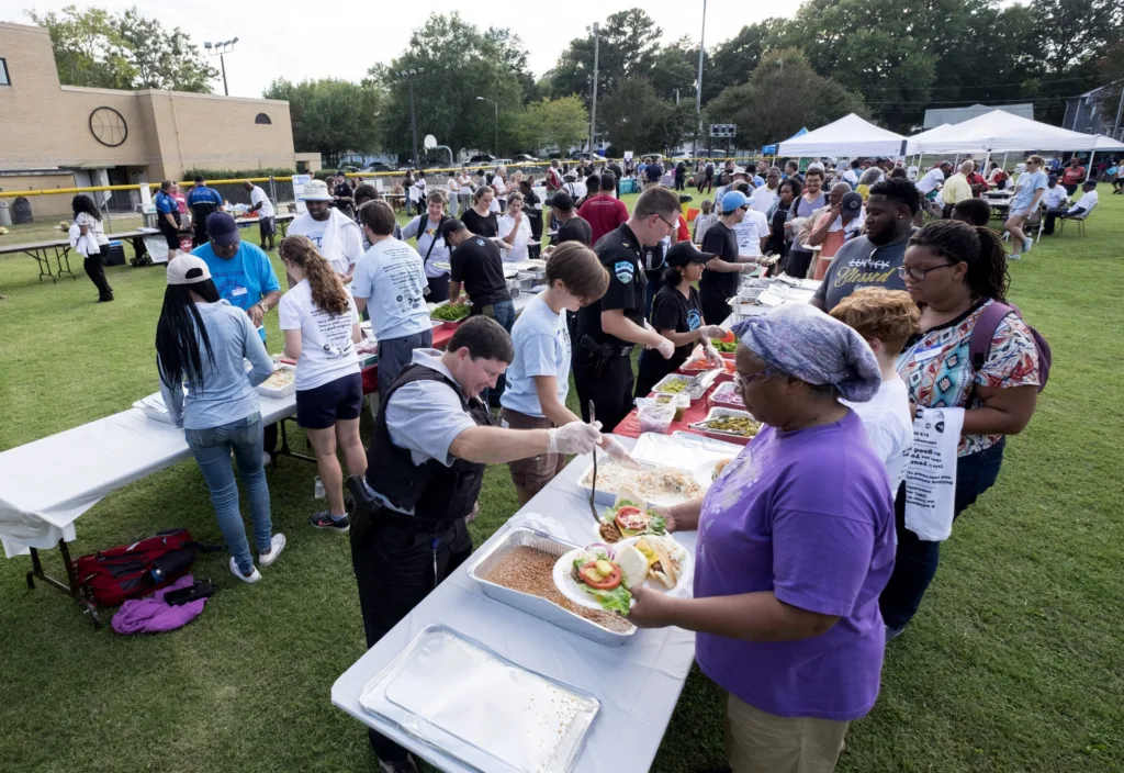 People eating food outdoors